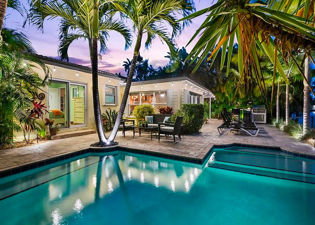 fort lauderdale luxury airbnb with pool and palm trees