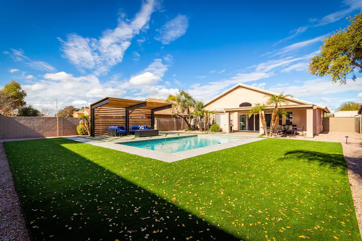 House with a pool and a garden in Chandler, AZ