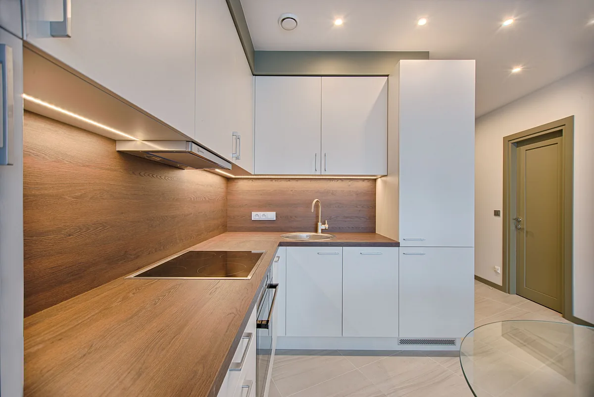 Open Air Homes management fees, Compact modern kitchen in a managed rental property