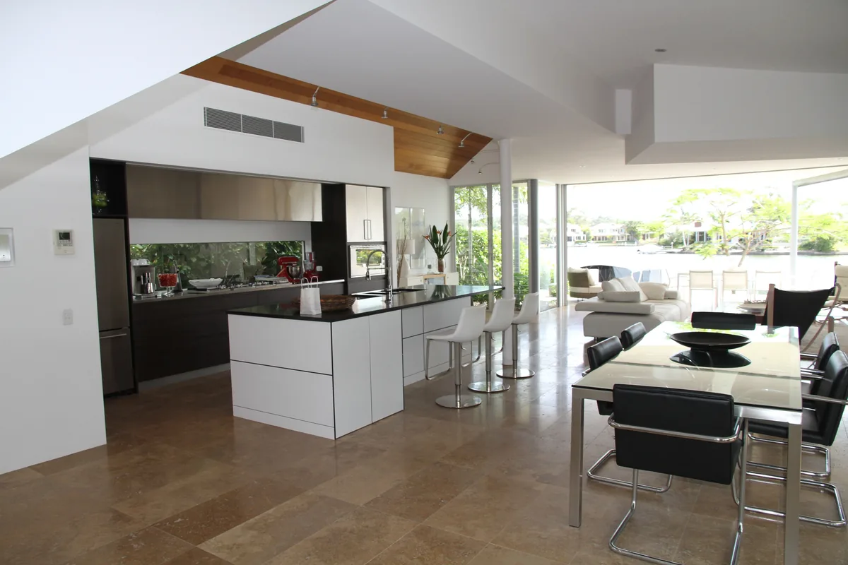 HostAid management fees, Modern open-plan kitchen and dining area in a rental home