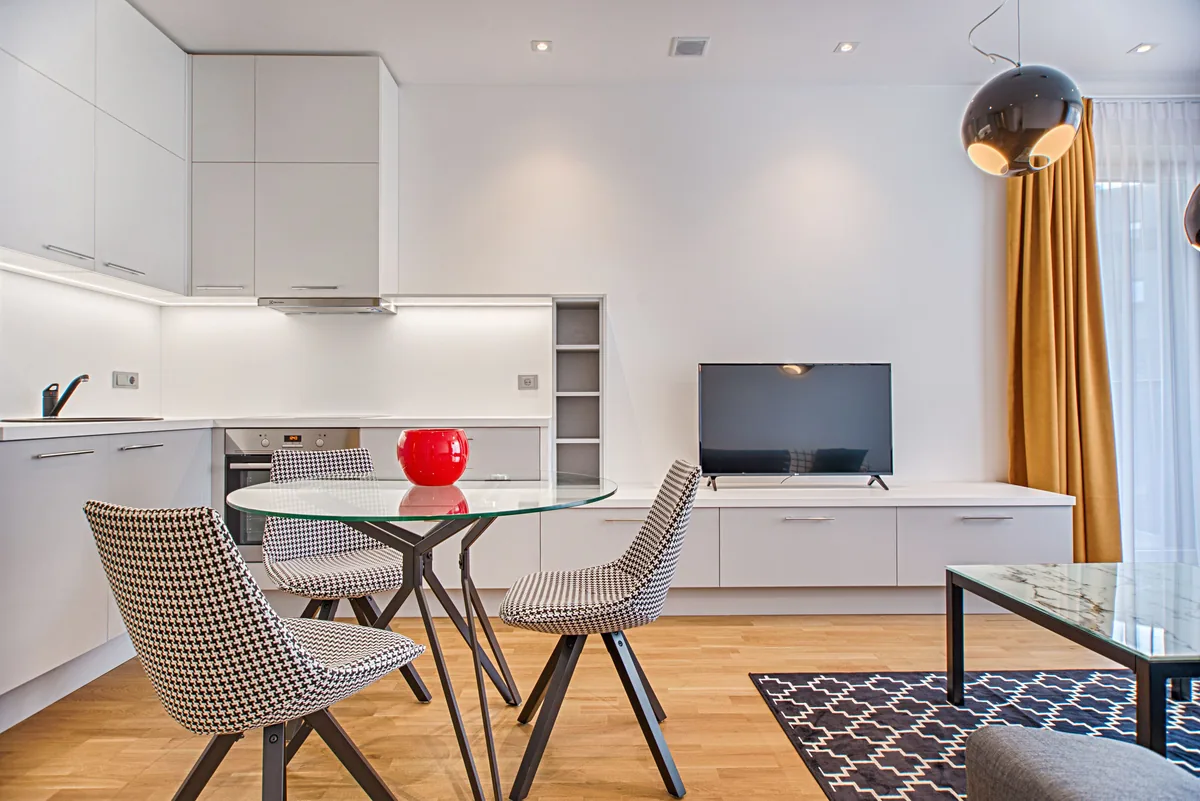 Twinity Properties alternatives for Airbnb owners, Dining area and kitchen in a modern rental apartment