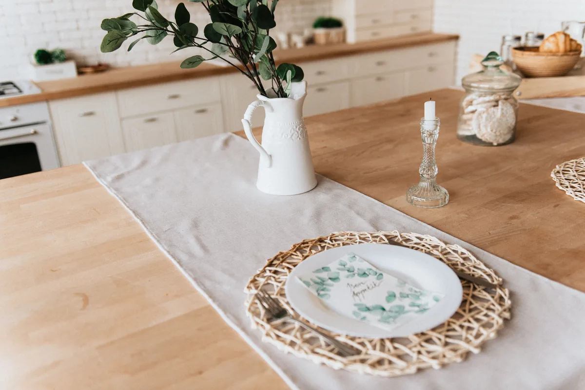 Meredith Lodging management fees, Dining table laid in a vacation rental kitchen