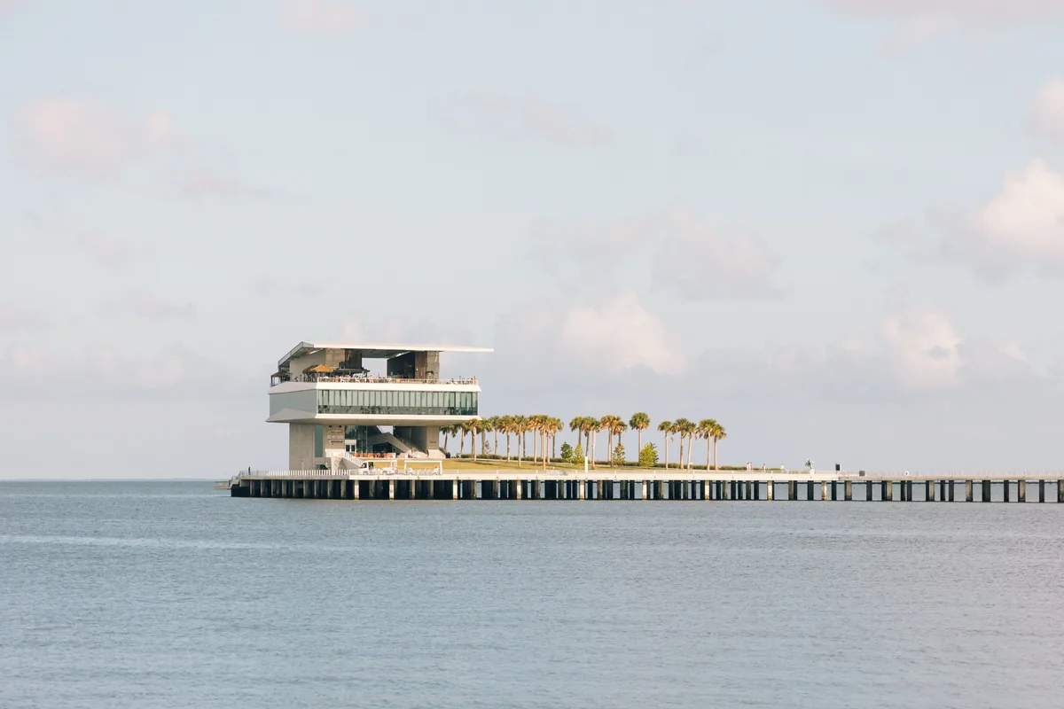 Emperor Rentals alternatives for Airbnb owners, Pier building standing out over calm water