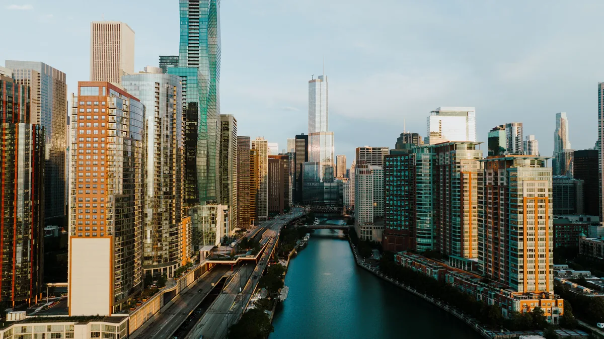 Domain management fees, Aerial view along the Chicago River corridor at dusk