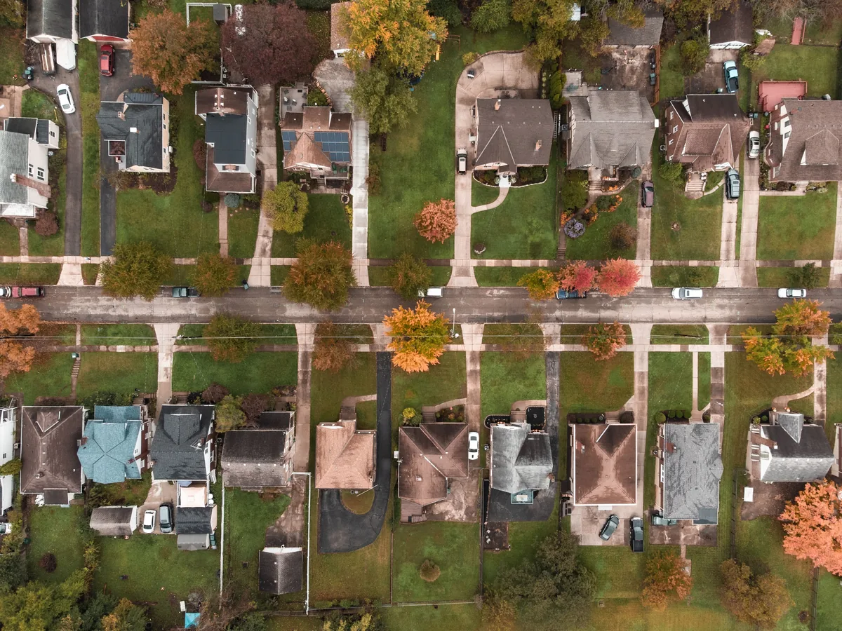 Preferred Guest Services alternatives for Airbnb owners, Aerial view straight down over a block of suburban houses