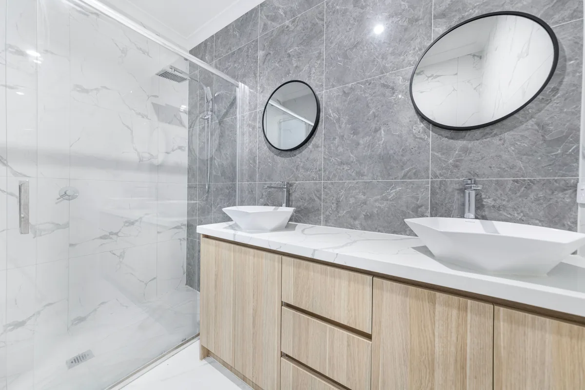 Modern bathroom, twin basins — Airbnb Occupancy Rate by City: 2026 Averages and How to Improve Yours