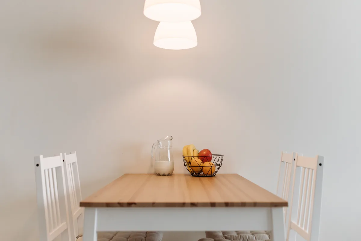 Dining table — Airbnb Travel Insurance: Is It Worth It for Guests and Hosts?