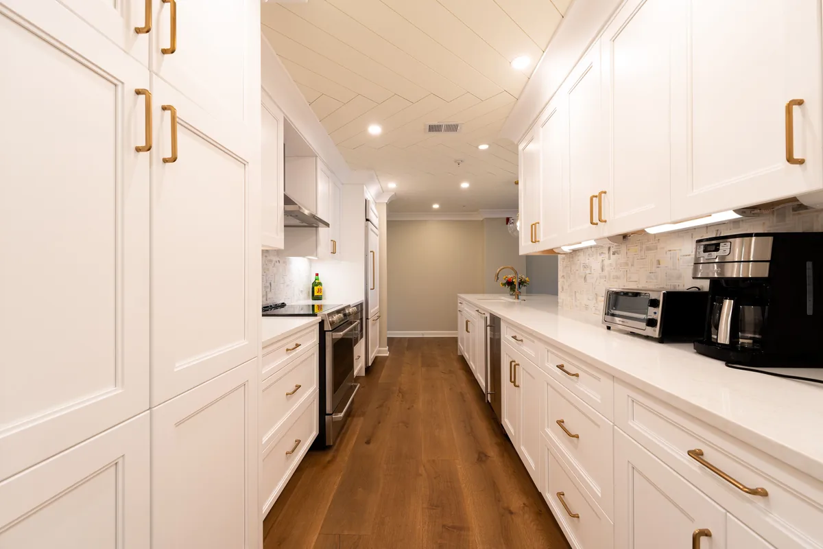 Galley kitchen in white — 6 Best Vacation Rental Management Companies in Clarksville, Tennessee