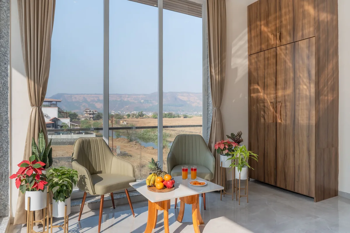 Seating area with plants and a valley view in a vacation rental