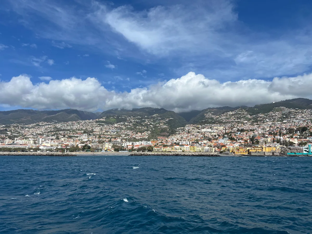 Gestao de Alojamento Local alternatives, Funchal seen from the water below its mountains