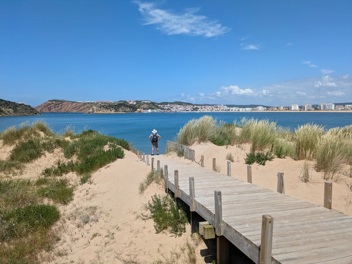 A boardwalk through dunes to an Atlantic beach