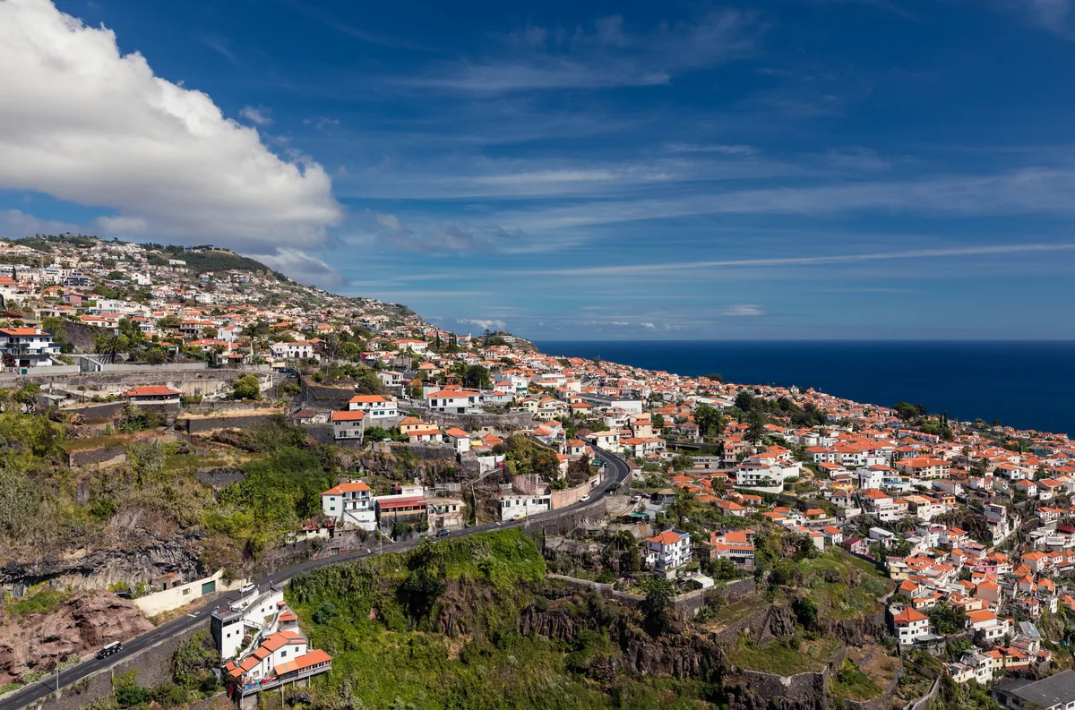Off Limits Madeira management fees, Madeira hillside houses above the ocean