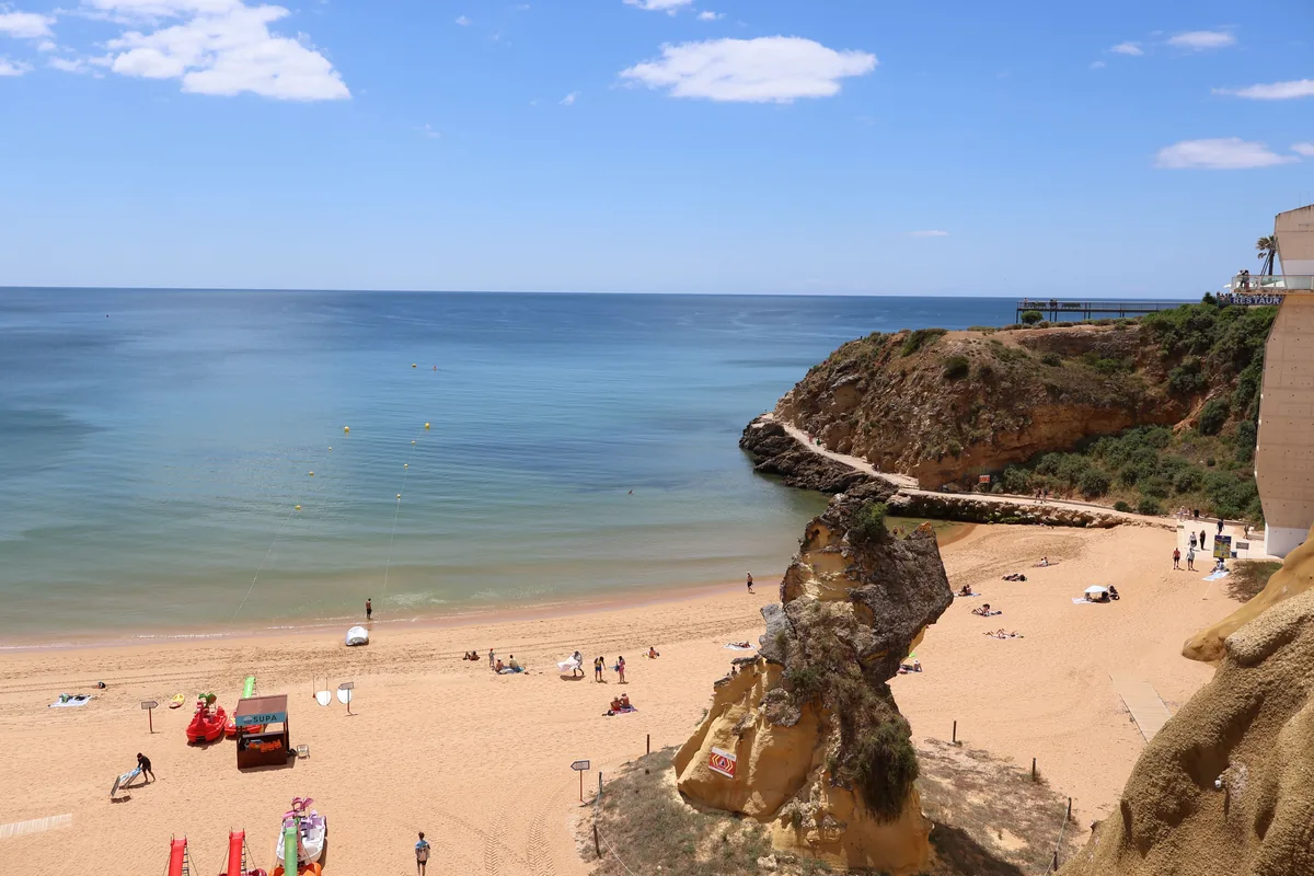 Amarante Villas alternatives Portugal, Cliff-backed Algarve beach with bathers below