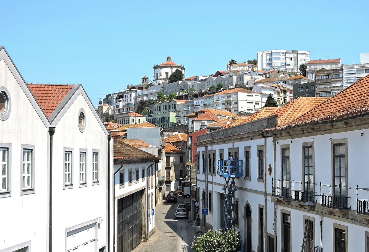 Feels Like Home alternatives for Portuguese owners, White Porto houses on the hillside