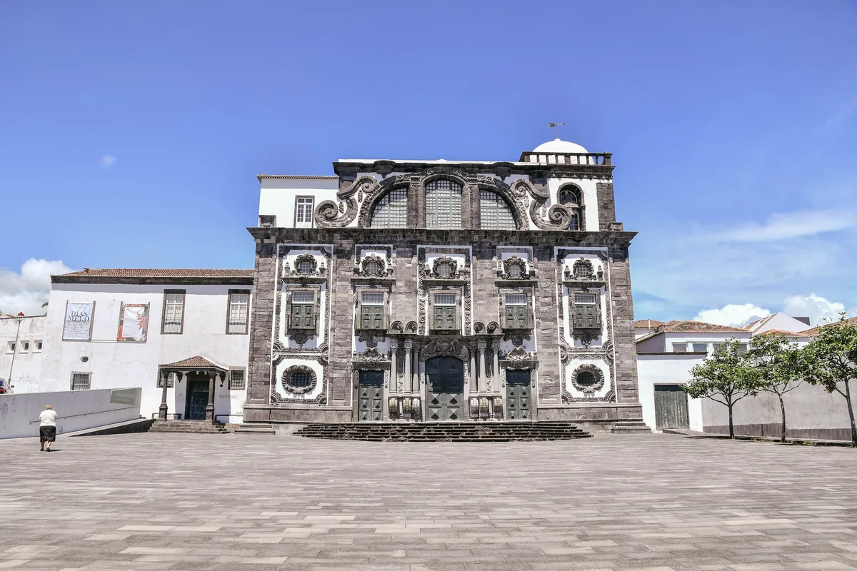 Green Vacations management fees, Baroque church facade in dark volcanic stone in the Azores