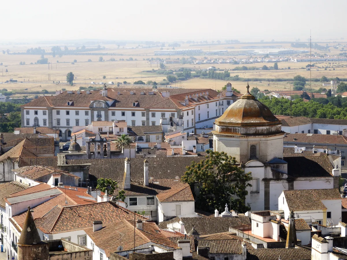 An aerial view of Evora's old town and the plain beyond