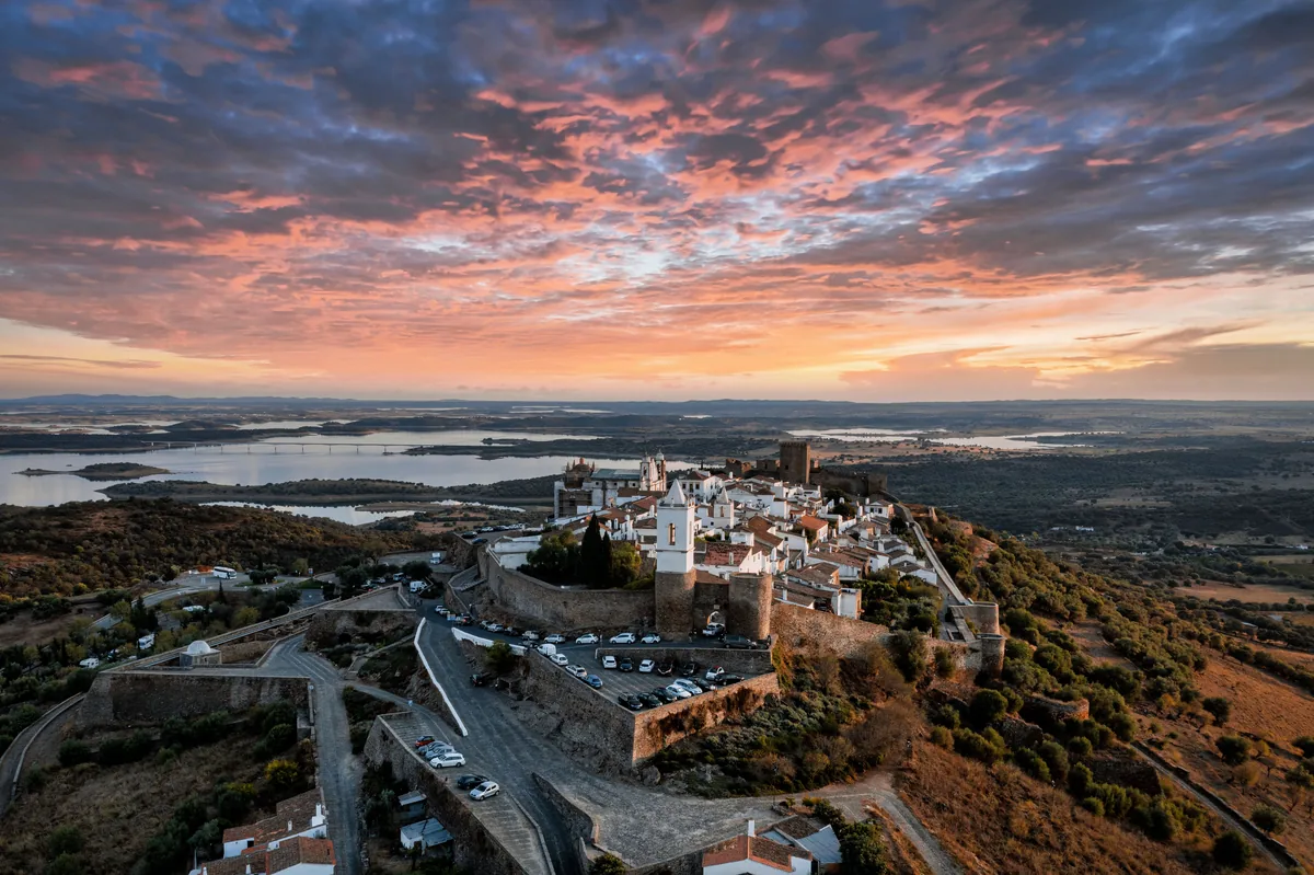 Monsaraz on its ridge above the Alentejo plain at sunset