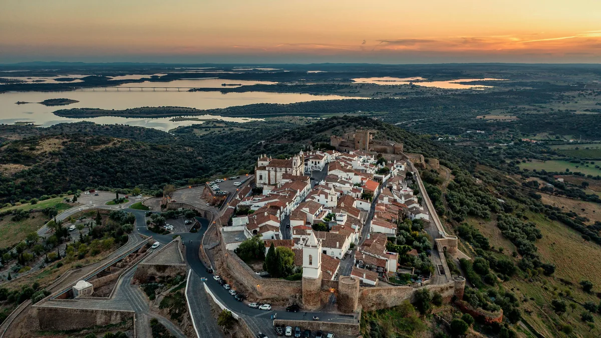 An aerial view of Monsaraz within its walls at sunset