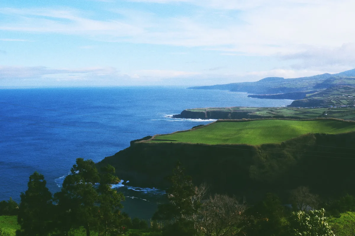 A green headland above the Atlantic on the Sao Miguel coast