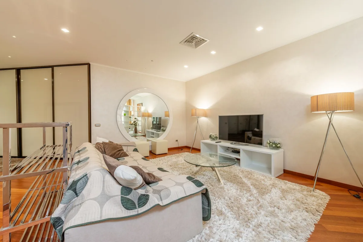A condominium living room furnished for short stays