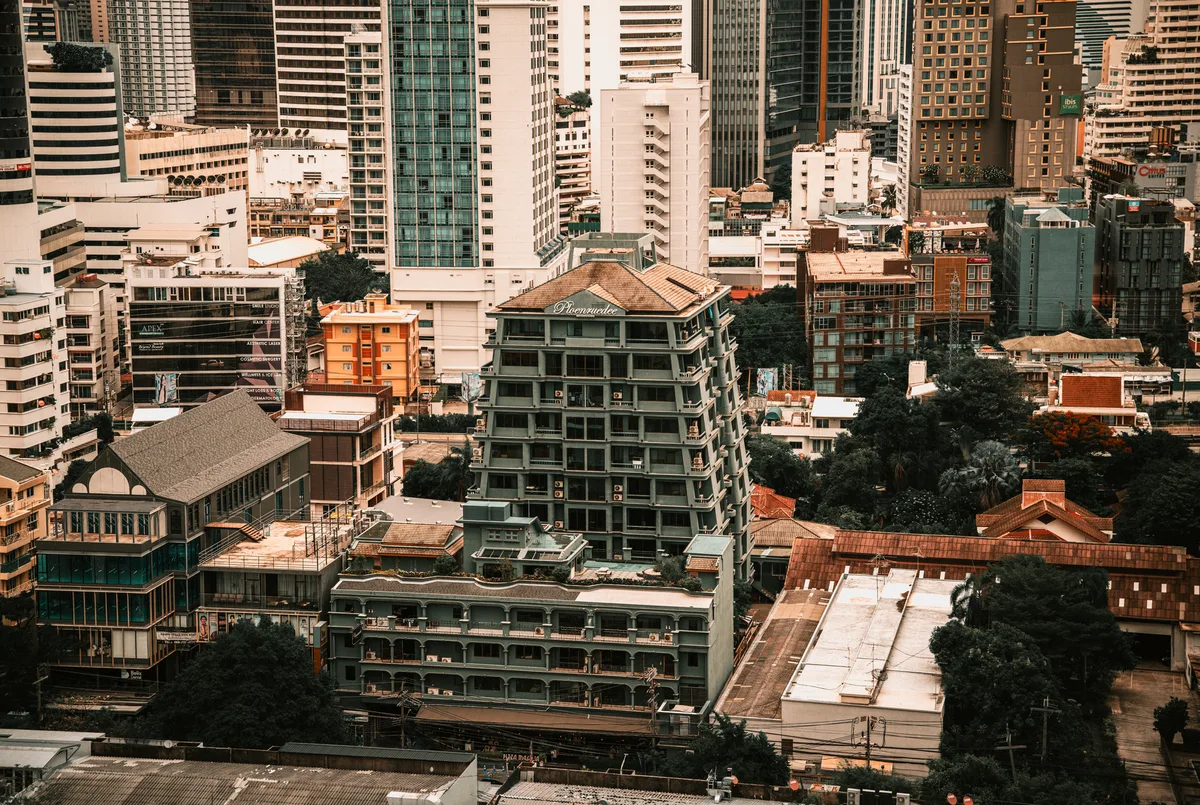 Bangkok short-term rental market, dense mix of old and new rooftops