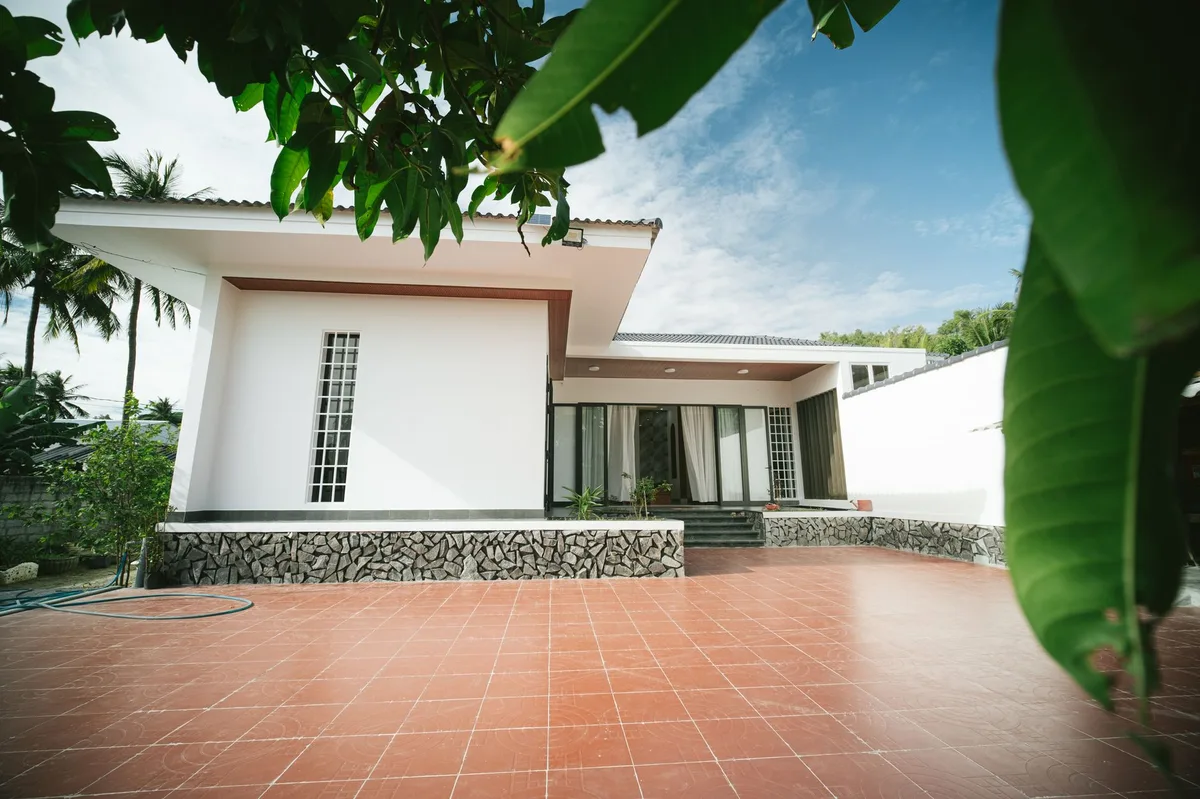 Thailand villa management, modern villa with a terracotta terrace