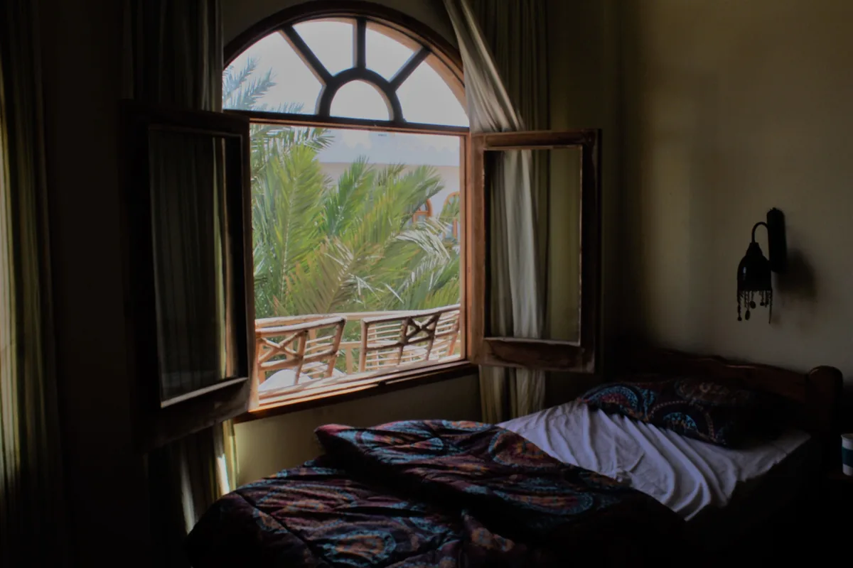 Bedroom with a large window