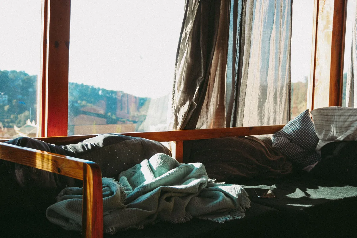 Bedroom with a large window