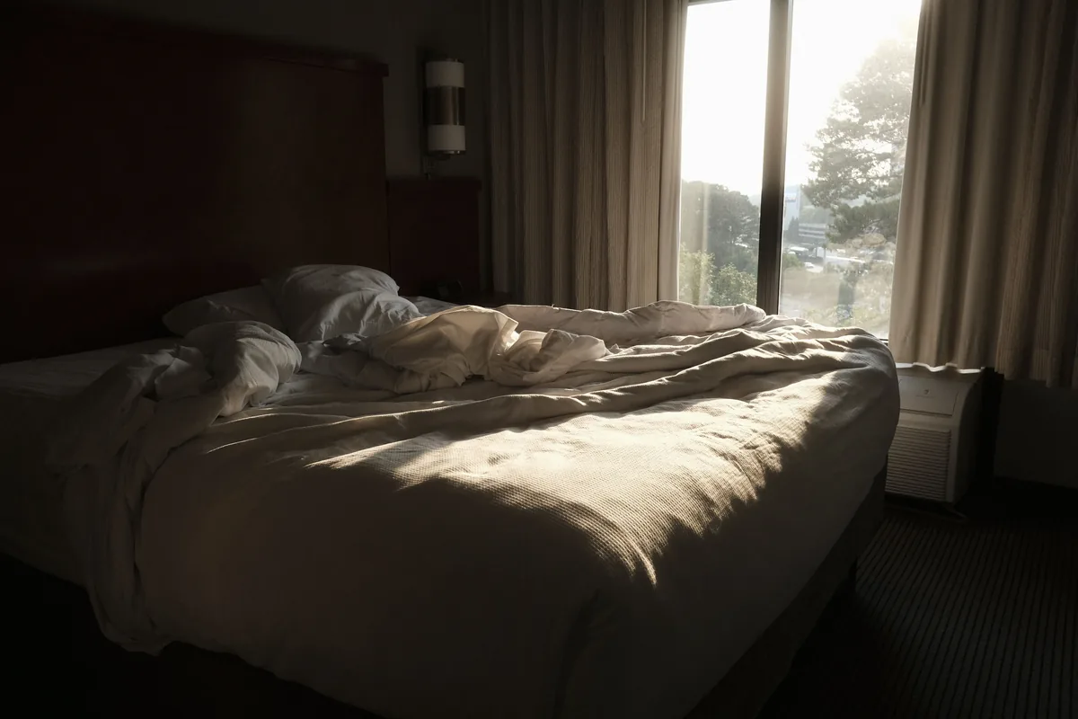 Bedroom with a large window