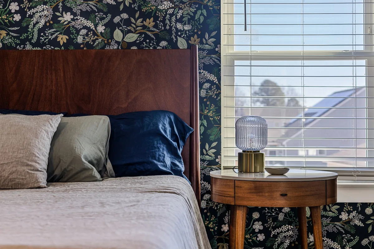 Bedroom made up with white linen