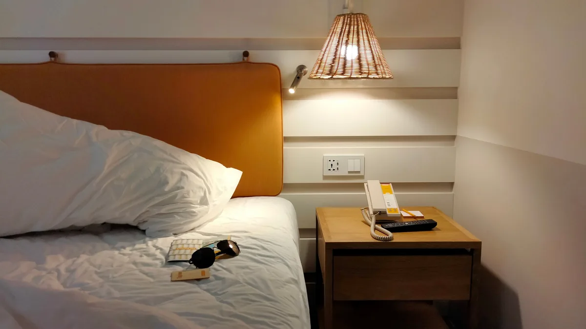 Bedroom with a bedside lamp