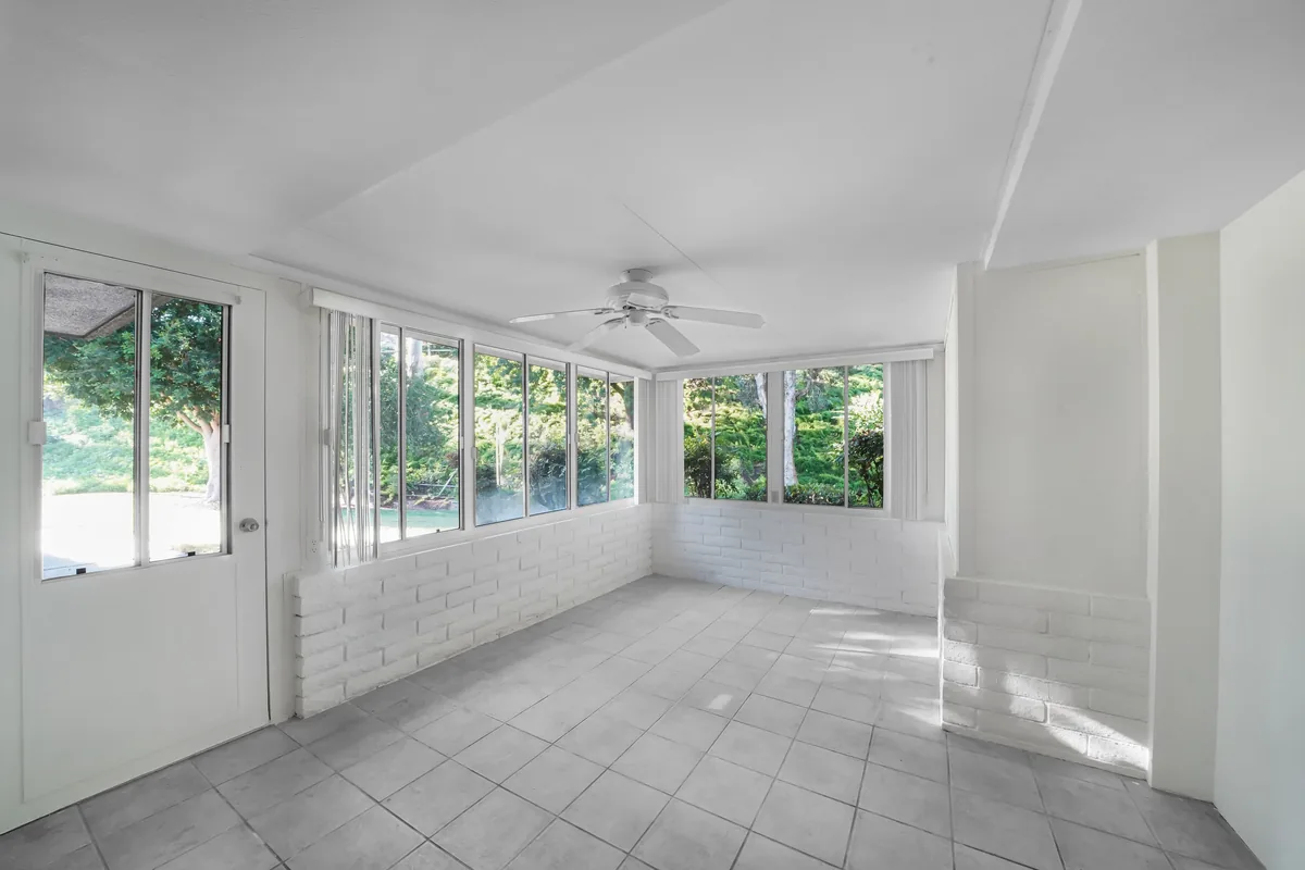 Sunroom with plants and windows