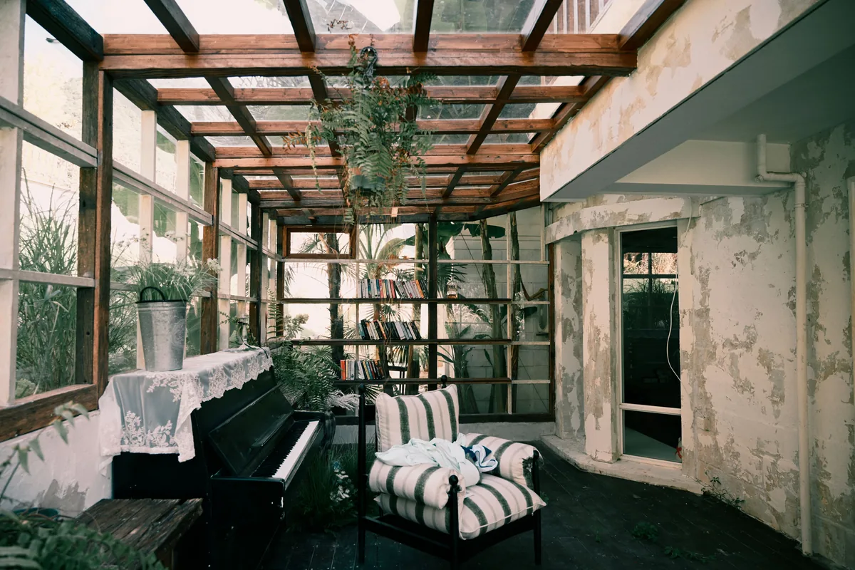 Sunroom with plants and windows