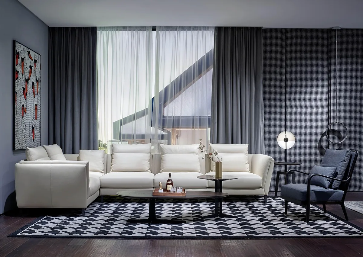 Basement lounge with a sofa