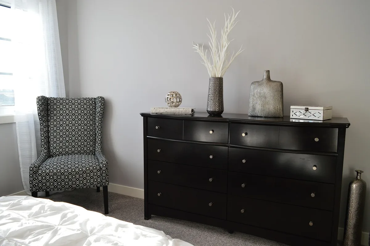 Bedroom made up with white linen