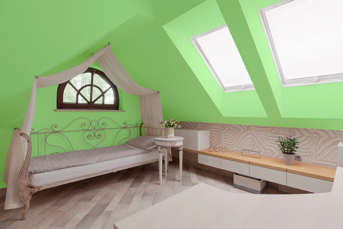 Bedroom made up with white linen
