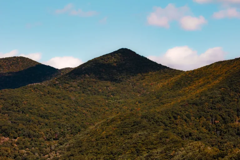 Mountain ridges beneath blue sky near Asheville