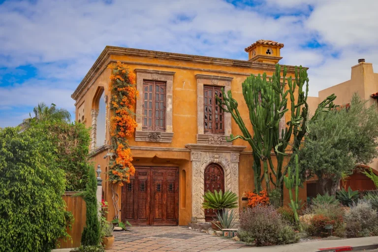 Mediterranean-style house with flowering plants