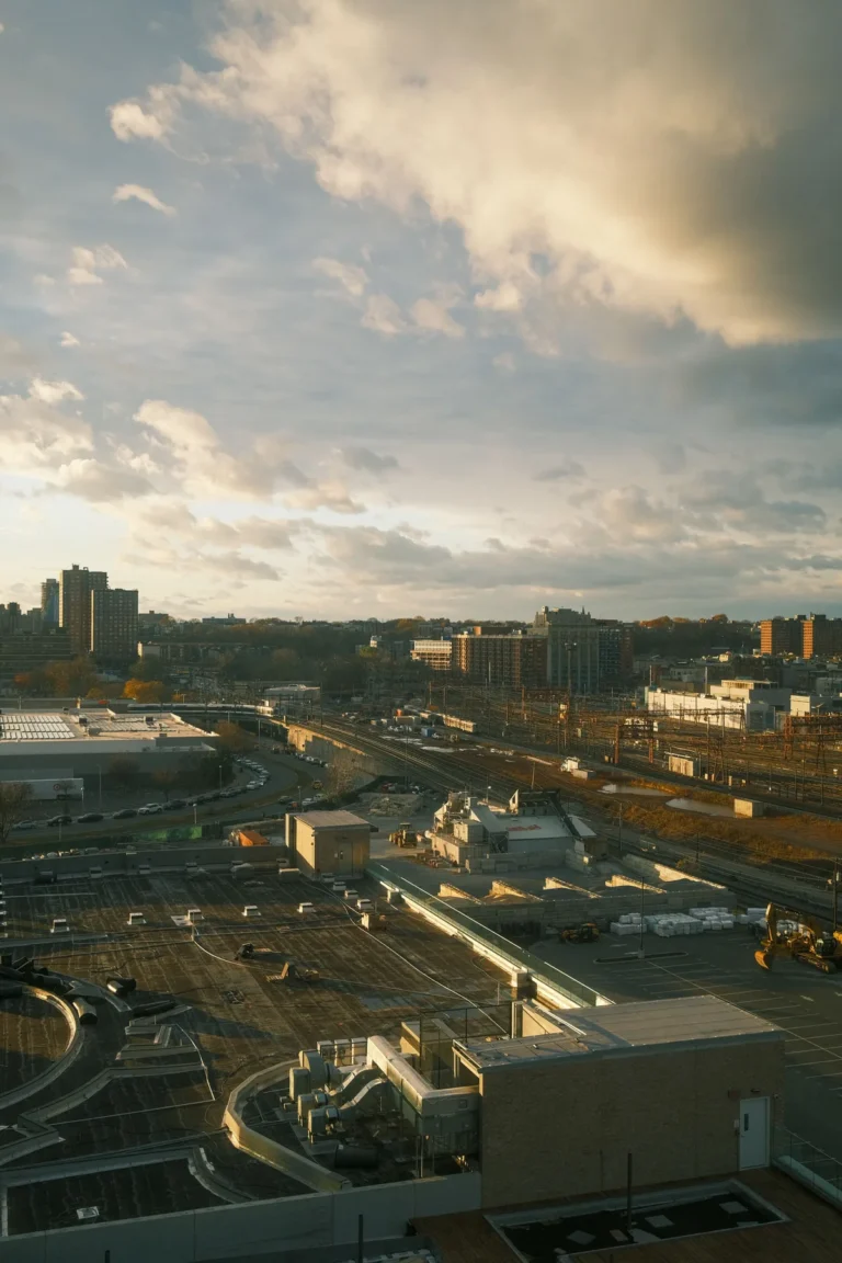 Hoboken urban rail lines and rooftops at sunset