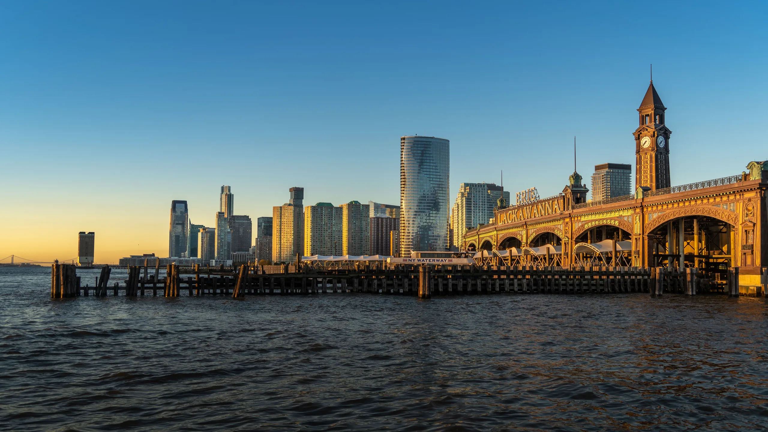 Hoboken waterfront buildings and clock tower at sunset