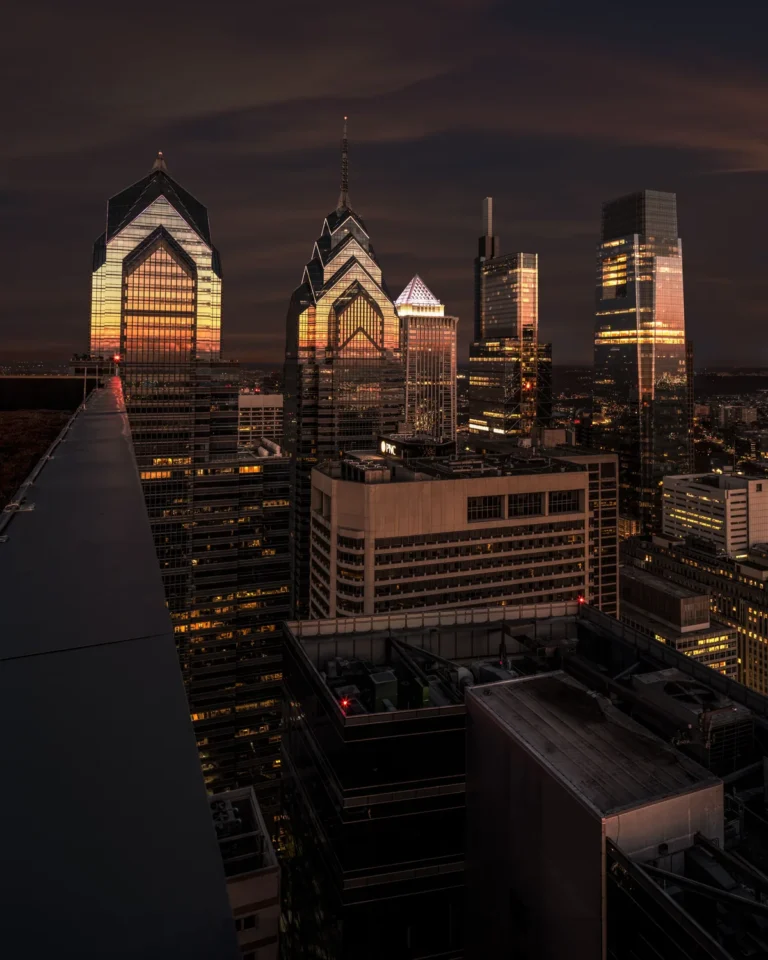 Philadelphia office towers glowing at dusk