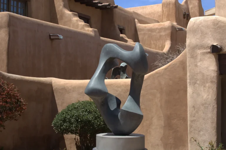Abstract sculpture between adobe walls in Santa Fe