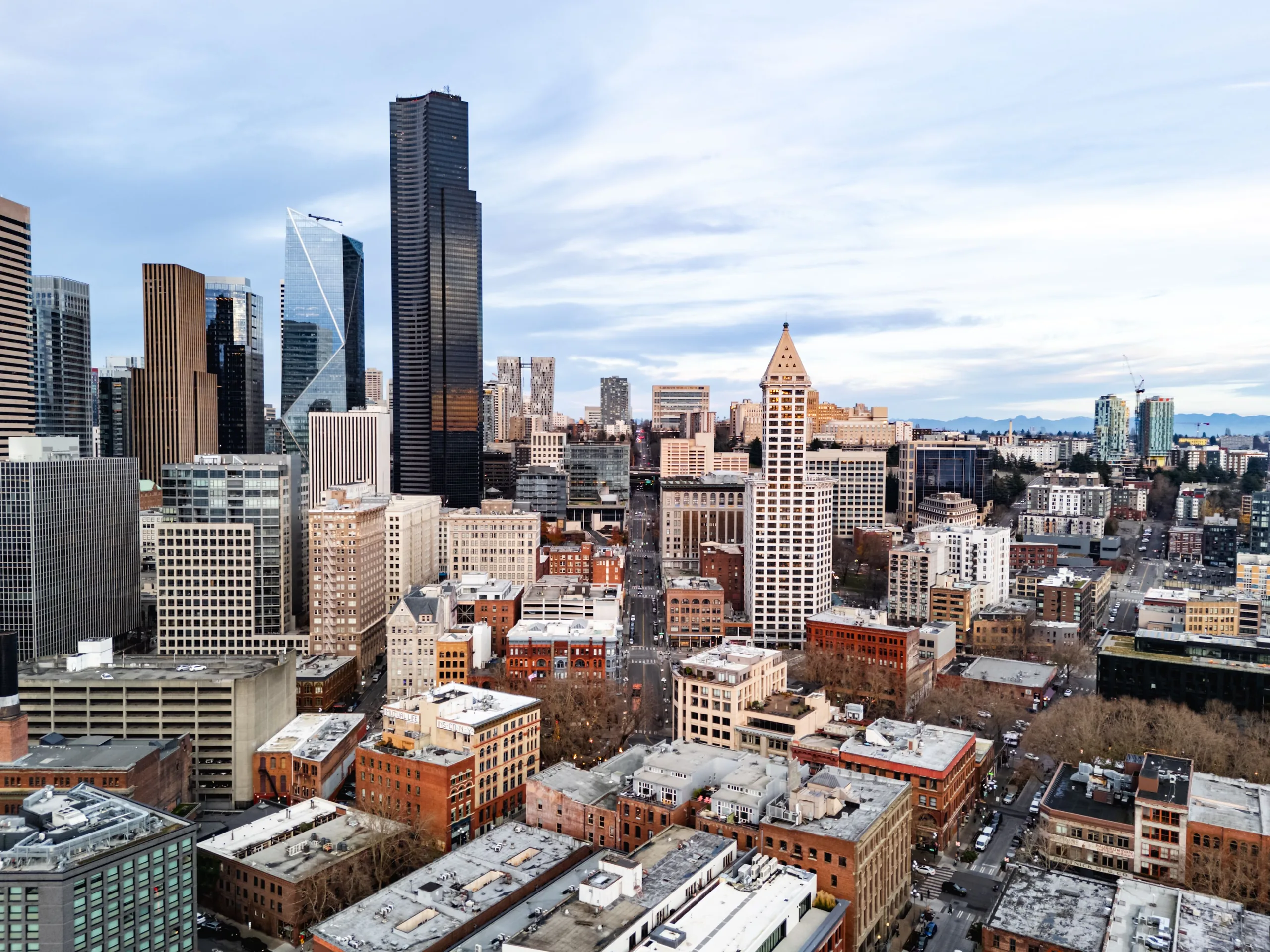 Downtown Seattle skyline seen above the surrounding rooftops