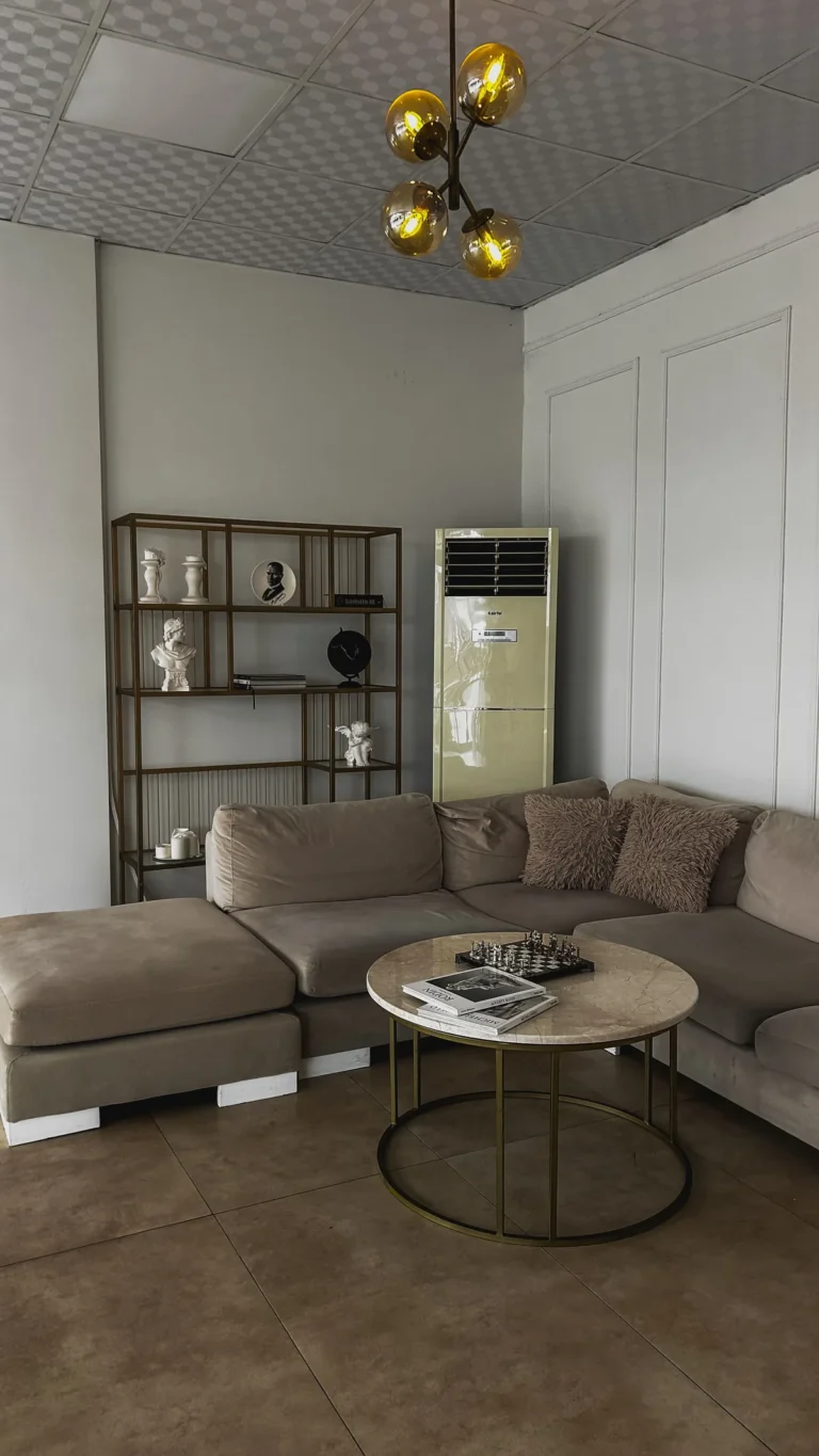 Contemporary living room with a brown sectional sofa
